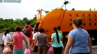 Как собирают мусор в Тайвани - смотреть видео (1:34)