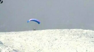 Экстрим на лыжах с парашютом - смотреть видео (1:57)