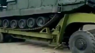 Погрузка военного вездехода - смотреть видео (0:59)