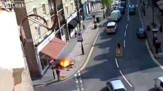 Взрыв из-под тротуара - смотреть видео (0:12)