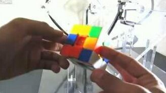 Сборка кубика Рубика за мгновение - смотреть видео (1:57)