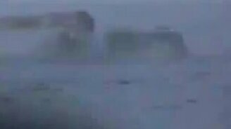 На КамАЗе вброд через зимнюю реку - смотреть видео (4:26)