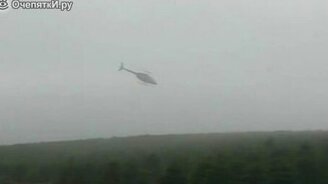 Мастерская погрузка ёлок вертолётом - смотреть видео (1:34)