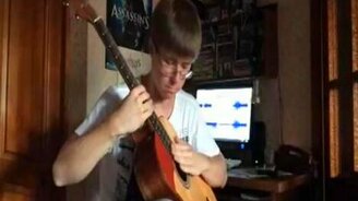 Своеобразная игра на гитаре - смотреть видео (3:19)