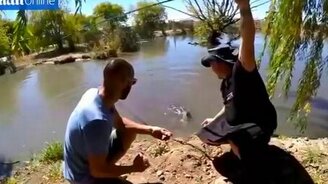 Прогулка по тросу над аллигаторами - смотреть видео (1:23)