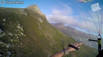 Полёт парашютиста над пляжем - смотреть видео (1:30)