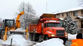 Масштабная уборка снега - смотреть видео (8:08)