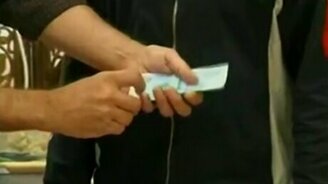 Ловкий фокус с деньгами - смотреть видео (1:21)