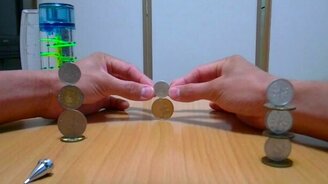 Искусство ставить монеты на ребро - смотреть видео (2:17)