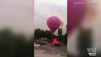 Воздушный шар налетел на провода - смотреть видео (0:22)