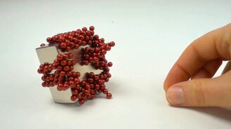 Столкновение магнитов в замедлении - смотреть видео (2:57)