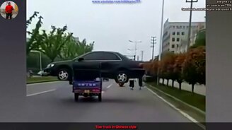 Эвакуация авто по-китайски - смотреть видео (1:03)