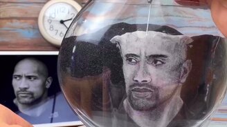 Портрет из песка - смотреть видео (0:48)