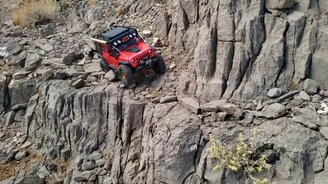 Красный Джип против скал - смотреть видео (0:31)
