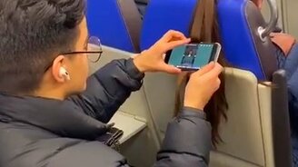 Повесил смартфон на волосы - смотреть видео (0:13)