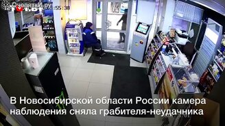 Работница АЗС прогнала грабителя - смотреть видео (0:50)