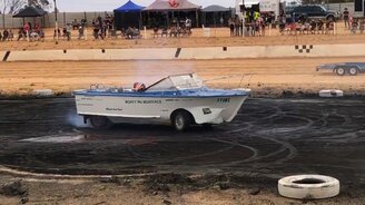 Моторная лодка на колёсах - смотреть видео (1:14)