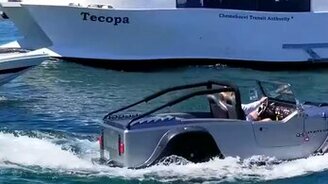 Джип плывёт по морю? - смотреть видео (0:28)